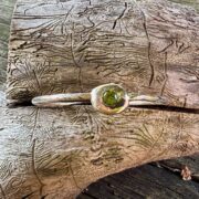 peridot-silver-bangle-flush set-faceted stone-sandrakernsjewellery peridot-silver-bangle-flush set-faceted stone-sandrakernsjewellery